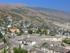 Gjirokaster / Argirocastro / Ergiri, Albania: roofs and mountains - UNESCO World Heritage Site - photo by J.Kaman