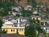 Gjirokaster, Albania: yellow mosque and houses on the slope - photo by J.Kaman