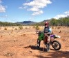 Wakooka Station (Queensland): bike rider and ant hills (photo by Luca Dal Bo)