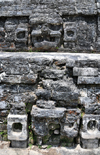 Altun Ha Maya city, Belize District, Belize: Temple of the Masonry Altars, stone masks of Mayan gods decorate the SW corner - photo by M.Torres