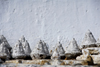 Bhutan, Paro: Clay Chorten offerings - photo by J.Pemberton