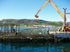 Canada / Kanada - Nain (Labrador): docks - backhoe - photo by B.Cloutier