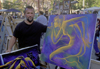 Santiago de Chile: artists display their painting in the Plaza de Armas - photo by C.Lovell