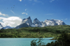 Torres del Paine National Park, Magallanes region, Chile: Cuernos del Paine - the Horns of Paine from Lake Nordenskjld  ducks in flight - Chilean Patagonia - photo by C.Lovell