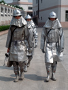 Dongguan, Guangdong province, China: Chinese firemen - in full gear - photo by B.Henry