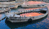 Moroni, Grande Comore / Ngazidja, Comoros islands: old wooden boats at sunset - photo by M.Torres