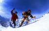 La Grave, Brianon, Hautes-Alpes, PACA, France: two people snowshoeing up-hill in the snowy mountains - photo by S.Egeberg