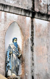 Libreville, Estuaire Province, Gabon: St. Paul holding a book, preaching the Gospel - niche on the faade of the old Saint Mary's cathedral - Notre-Dame de Neiges - photo by M.Torres