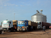 Banjul, The Gambia: trucks wait for their turn at the ferry terminal - there is no bridge over the river Gambia, all commerce uses ferries, including traffic between north and south Senegal - photo by M.Torres