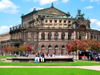 Dresden, Saxony / Sachsen, Germany / Deutschland: Semper Opera House, home of the Saxon State Opera - Theater Square - people sitting on a fountain - photo by E.Keren