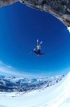 Greenland, Apussuit: skier doing a backflip off high ice cliff - photo by S.Egeberg