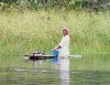 Guyana - Demerara River: woman doing the washing (photo by G.Frysinger)