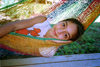 Hawaii - Maui island: girl resting in a hammock (photo by G.Friedman)