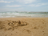 Israel - Kibbutz Sdot Yam: sand castle with shells - photo by Efi Keren