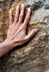 Jerusalem, Israel: Via Dolorosa - hand over the cavity which is said to be the imprint of Jesus hand, near 5th station - photo by M.Torres