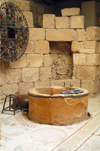 Mount Nebo - Madaba governorate - Jordan: VII century baptistry in the basilica - south side of the church - baptismal font, bearing bishop Sergios' name - photo by M.Torres