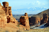 Kazakhstan, Charyn Canyon: way down to the Valley of the castles - in the background the Tian Shan mountains, marking the border with China - photo by M.Torres