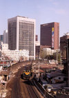 Asia - South Korea - Seoul: railways - train and skyscrapers - photo by M.Torres