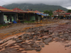 Laos - Pakxe / Paks - Champasak province: muddy road - photo by M.Samper