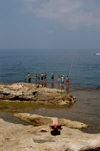 Lebanon / Liban - Beirut: an angler prays - photo by J.Wreford