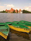 Lithuania / Litva / Litauen - Trakai / Troki : small boats and Trakai Castle built by Grand Duke Vytautas - Karaliskas Sodas - photo by J.Kaman