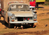 Tsimafana, Belo sur Tsiribihina district, Menabe Region, Toliara Province, Madagascar: Peugeot 404 Diesel pickup and chicken, an old workhorse of Francophone Africa - car designed by Pininfarina - photo by M.Torres