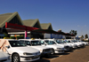 Antananarivo / Tananarive / Tana - Analamanga region, Madagascar: terminal at Ivato International Airport - operated by ADEMA - IATA TNR - line of taxis - photo by M.Torres