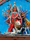 Kali Amman Temple - goddess Devi, mounted on a lion, fighting against evil, Pulau Pankor Island, Malaysia. photo by B.Lendrum