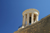 Malta: Valleta - Siege Bell Monument - Inaugurated in 1992 by Queen Elizabeth II, Memorial to the dead of World War II. The bell is rung at mid-day, each day - photo by A.Ferrari