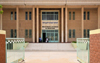 Nouakchott, Mauritania: people sit at the entrance of the National Library of Mauritania - photo by M.Torres