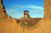 Gobi desert, southern Mongolia: tower - new buildings in the ruins of a monastery complex, Ongiin Khiid - photo by A.Ferrari