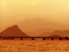 Montenegro - Crna Gora - Lake Skadar / Scutari / Skadarsko jezero - national park: curves / silhouette - bridge and hills - sepia - photo by J.Kaman