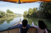 Montenegro - Lake Skadar: children boating on the lake - photo by D.Forman