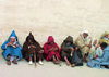 Morocco / Maroc - Fez: colours - men in jallabas against a wall - photo by J.Kaman