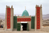 Morocco / Maroc - Imilchil: mosque covered in Moroccan flags - photo by F.Rigaud