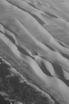 Namib desert: meeting the South Atlantic ocean - black and white - photo by J.Banks