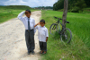 Nepal - Kathmandu valley: kids offer a salute - while mountain biking in Kathmandu surrounding mountains - photo by M.Wright