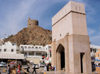 Oman - Muscat: arch and watch tower - photo by B.Cloutier