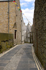 Orkney island - Stromness- narrow street - southwestern edge of the mainland of Orkney - photo by Carlton McEachern