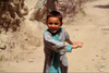 Pakistan - Karimabad (formerly called Baltit) - Northern Areas province: little girl running - photo by A.Summers