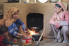 Jabbar Nara Pata, Siran Valley, North-West Frontier Province, Pakistan: Pashtun women cooking at home - photo by R.Zafar