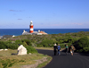 Cape Agulhas / Cabo Agulha, Overberg District, Western Cape, South Africa: lighthouse at Africa's southernmost point - dividing point between the Atlantic and Indian oceans - Portuguese for 'Cape of Needles' - the lighthouse was designed as a homage to the Pharos of Alexandria - vuurtoring - photo by D.Steppuhn