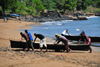 Pantufo, gua Grande district, So Tom and Prncipe / STP: fishermen land their pirogues on the beach / pescadores trazem as pirogas para terra - praia - photo by M.Torres