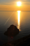 Nebida, Sardinia / Sardegna / Sardigna: sunset on the Gonnesa gulf over the Agosteri rock - limestone stack - Scoglio l'Agosteri - faraglione - photo by M.Torres