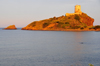 Pula, Cagliari province, Sardinia / Sardegna / Sardigna: Coltelazzo islet, Cape Pula and the Spanish tower of SantEfisio / torre del Coltelazzo - golfo di Cagliari - photo by M.Torres