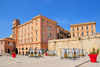 Cagliari, Sardinia / Sardegna / Sardigna: Palazzo Boyle and Scuole di S. Caterina - photo exhibition on Terrazza Umberto I - Palazzo Boyl, built in 1840 by Charles Pilo Boyle, Marquis Putifigari, of Catalan origin, commander of the Royal Artillery arsenal, incorporates a thirteenth century tower by Giovanni Capula - quartiere Castello - photo by M.Torres