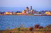 Cabras, Oristano province, Sardinia / Sardegna / Sardigna: Stagno di Cabras lagoon and Church of the Assumption of the Virgin - 16th century - Chiesa di Santa Maria Assunta - Duomo di Cabras - photo by M.Torres