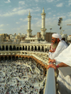 Mecca / Makkah, Saudi Arabia: a Muslim man looks at Kaaba in Haram Mosque, from third floor - Masjid al-Haram during Hajj, Dhu al-Hijjah month - photo by A.Faizal