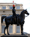 Scotland - Glasgow - a modern art Duke of Wellington statue outside the Glasgow Gallery of Modern Art - cone - photo by C.McEachern