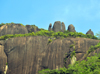 Mahe, Seychelles: Pointe Larue - rock wall and natural 'menhirs' near the airport - photo by M.Torres